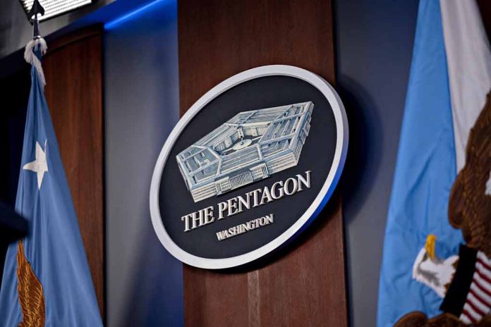 The Pentagon logo with flags in the background.