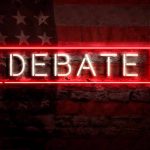 Neon red "DEBATE" sign on American flag background.