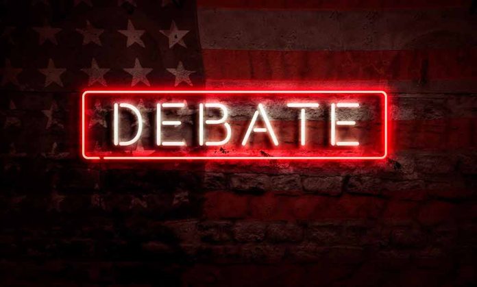 Neon red "DEBATE" sign on American flag background.