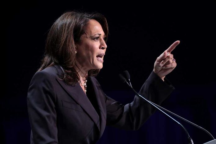 Person speaking at podium with raised finger.