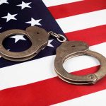 Handcuffs on american flag