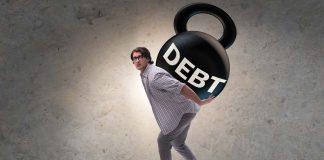 Man carrying the weight of debt