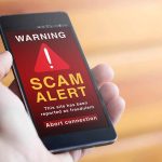 Scam Alert On Phone Screen
