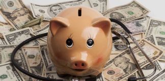 Piggy bank on a pile of money
