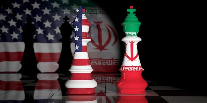 Chess pieces with USA and Iran flags.