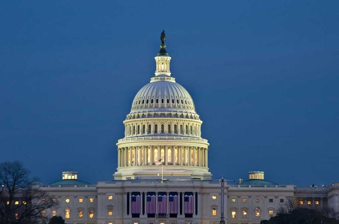 U.S. Capitol building illuminated at dusk.