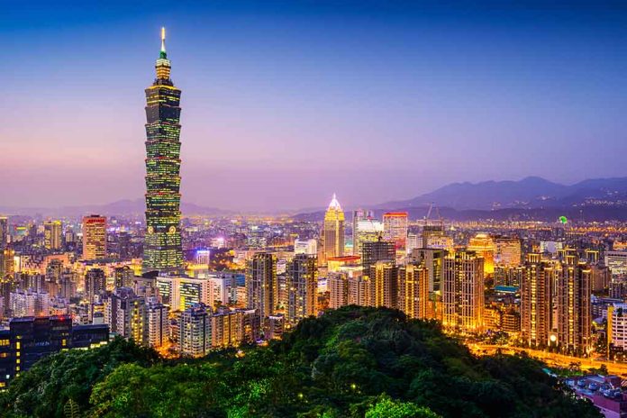 Taipei skyline at dusk with Taipei 101 tower.