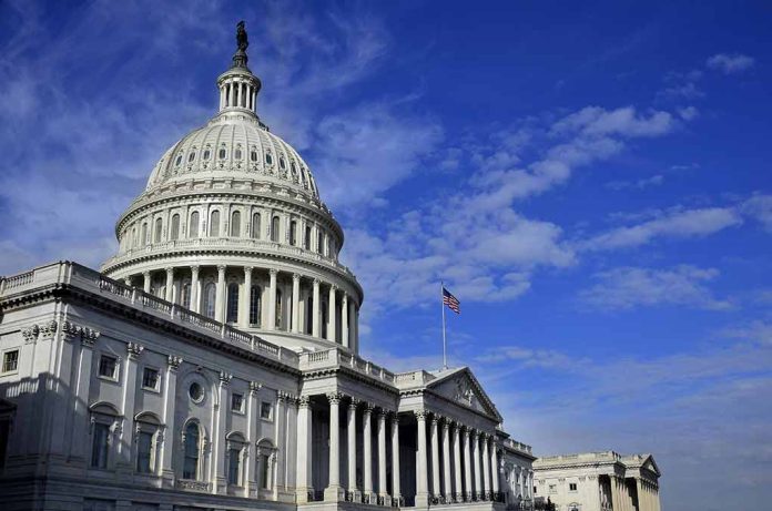 US Capitol building under a blue sky.