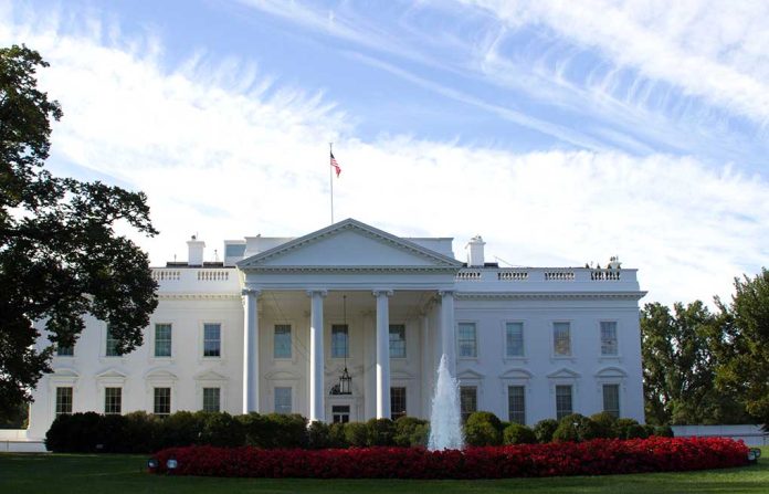 White House with fountain and cloudy sky