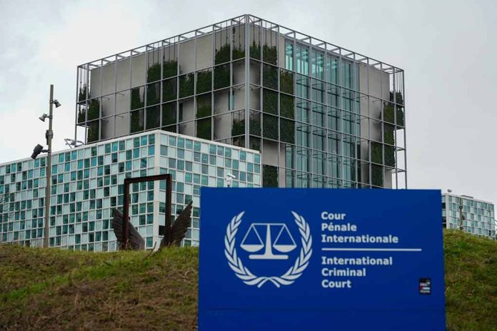 International Criminal Court building with sign in foreground.