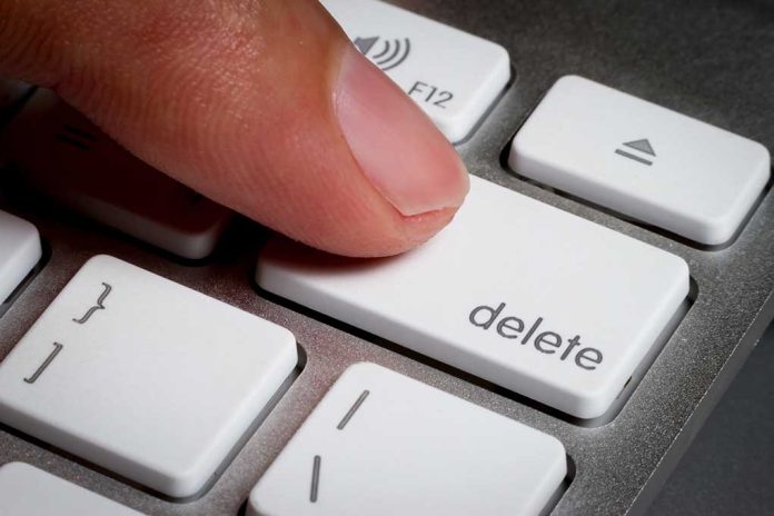 316937297 featured image Finger pressing a delete key on keyboard