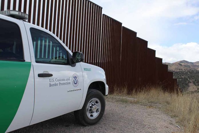 1478048393 featured image Border protection vehicle near a large metal fence
