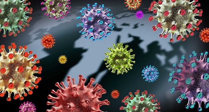 1924081337 featured image Colorful virus particles on dark map background