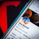 Phone screen showing Twitter profile with spacescapes