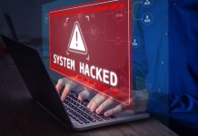 Warning sign System Hacked on laptop screen