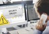 Security breach alert displayed on computer monitor
