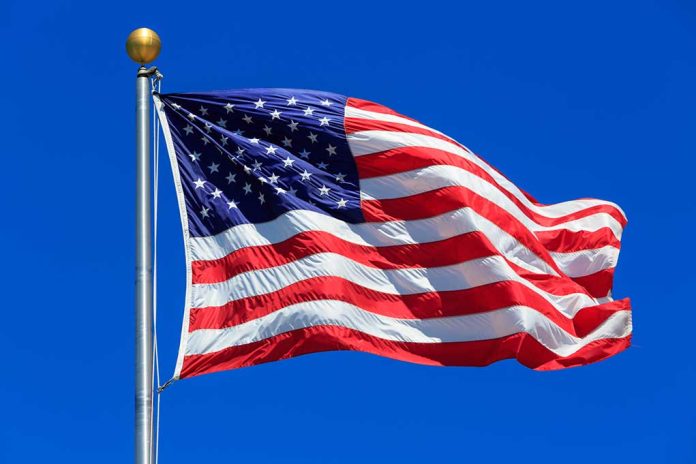 442392457 featured image United States flag waving against blue sky