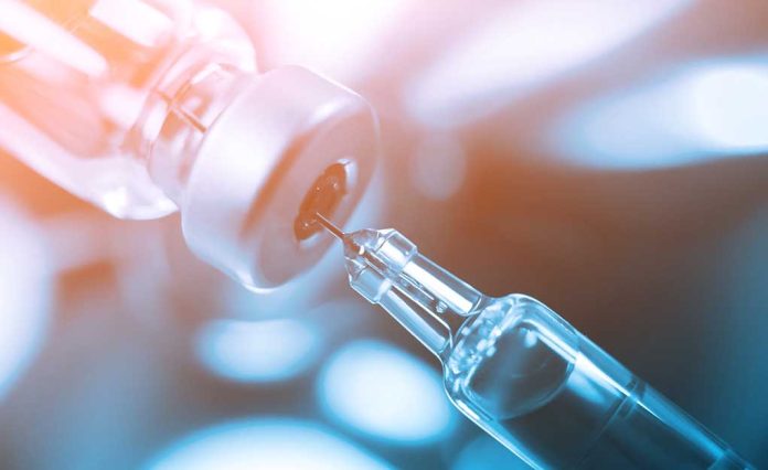 735742660 featured image Syringe drawing liquid from a vial