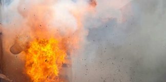 A large explosion with flames and smoke