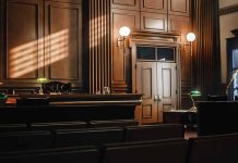 Empty courtroom with judge s bench and wooden decor
