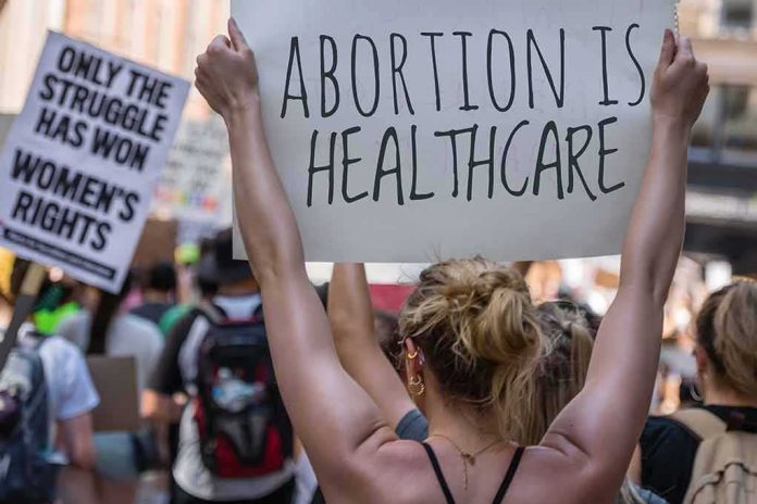 2172202723 featured image Protestors holding signs about women's rights and healthcare