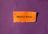 Product Recall text on orange paper purple background