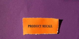 Product Recall text on orange paper purple background
