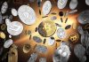 Various cryptocurrencies floating against a golden background