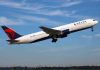 Delta airplane taking off from runway