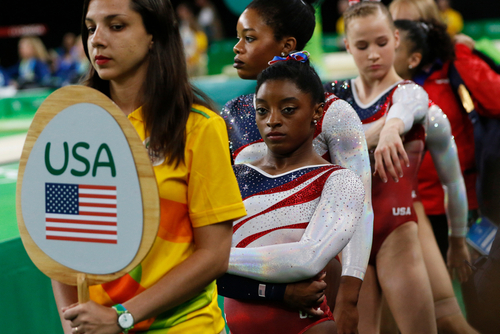 shutterstock_2018151131.jpg featured image USA gymnasts waiting in line at an event.