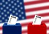 Ballots in boxes with American flag background
