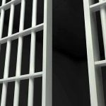 Close-up of prison cell bars