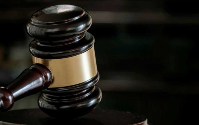 1707837892 Close up of a judge's gavel