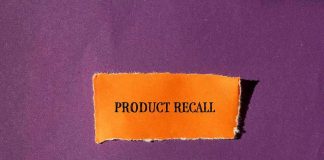 "Product Recall" text on orange paper, purple background.