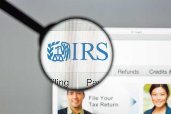 696480121 Magnifying glass over IRS website