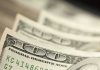 Closeup of stacked one hundred dollar bills