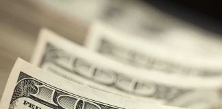 Closeup of stacked one hundred dollar bills