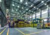 Interior view of a modern industrial facility with manufacturing equipment