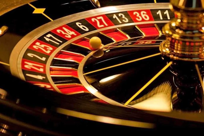 Close up of a roulette wheel with a spinning ball