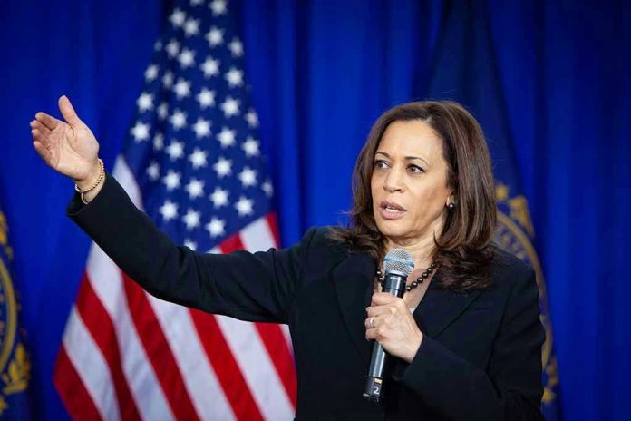 1380838349 Woman speaking and gesturing with American flag background.