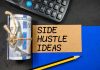 A rolled bundle of cash next to a note that says 'Side Hustle Ideas'