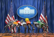 HYPOCRITE Jean-Pierre Gets Brutal Reality Check Multiple microphones at White House press briefing podium.