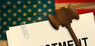 A legal document labeled INDICTMENT with a gavel and pencil