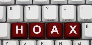 Prank Leads to Mayhem — 50 Cars to NOWHERE! Close-up of a computer keyboard with the word HOAX spelled out in red keys