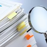 “Arctic Frost” – New Revelations – Worse Than Watergate Stack of documents with a magnifying glass beside it