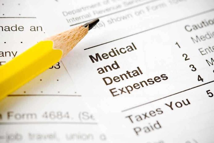 shutterstock_182117390.jpg Close-up of tax document with medical and dental expenses section and a yellow pencil