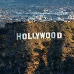 Actress’s Shocking Cult Ties Exposed! The Hollywood sign on a hillside.