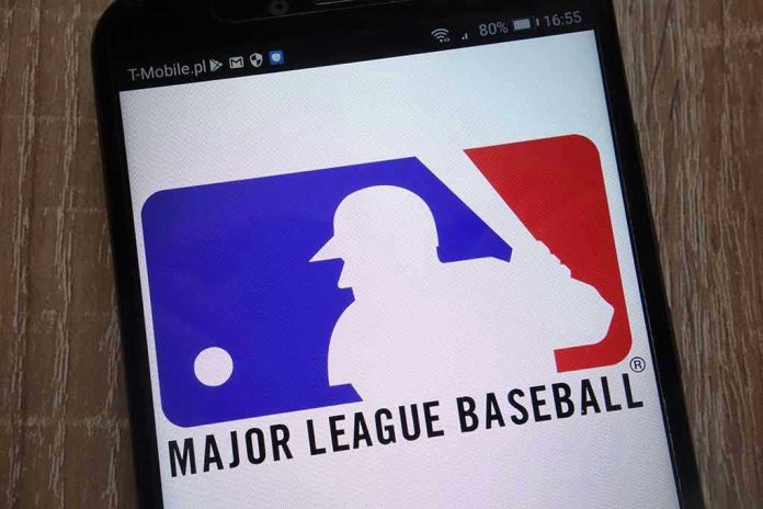 1181883586 Major League Baseball logo on a smartphone screen.