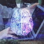 Stress-Busting Brainwave Method: Too Good to Be True? Futuristic AI brain hologram above a laptop computer.