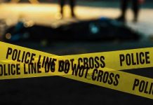 Ex-Boyfriend MURDERS Couple — Kids Watch HORROR Police tape marking a crime scene at night.